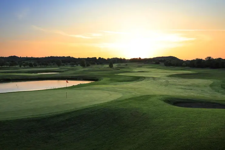 Un green dell'Arzaga Golf Club al tramonto